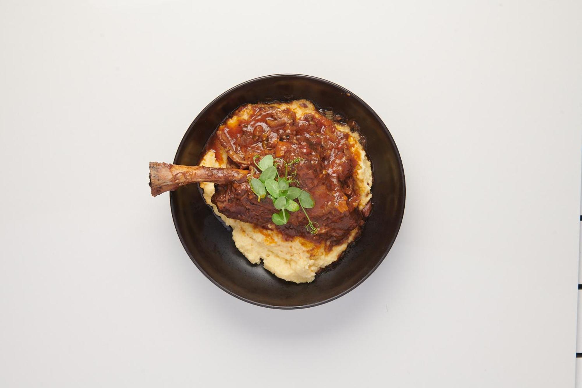 The Capital Zimbali Hotel Ballito Exterior photo A plate of braised duck with mashed potatoes