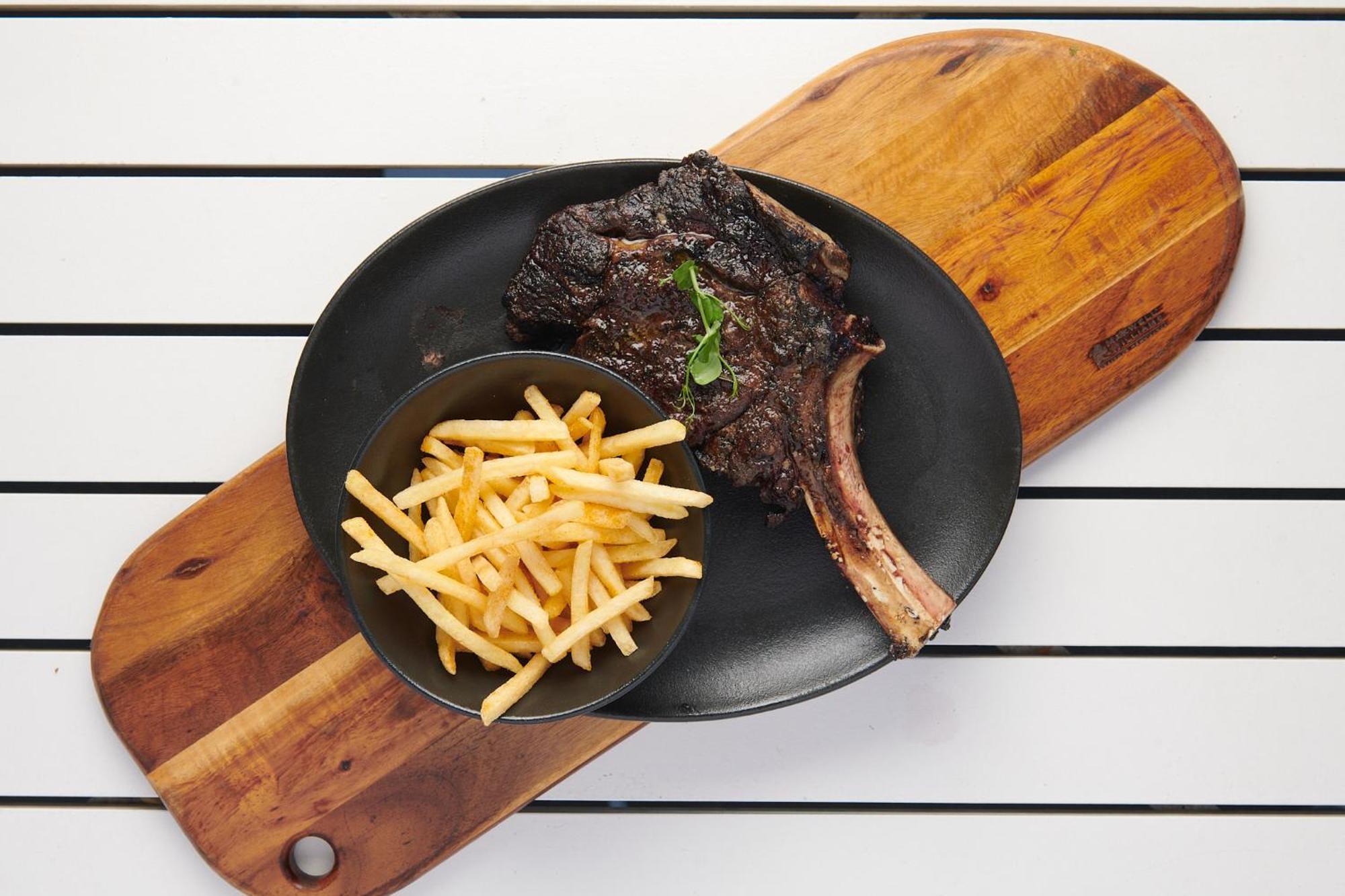 The Capital Zimbali Hotel Ballito Exterior photo A steak and chips meal